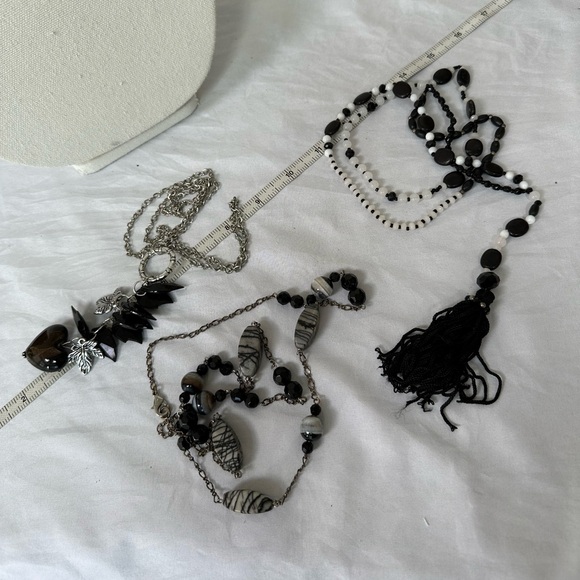 Three long silvertone and black statement necklaces - Picture 8 of 8